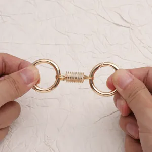 Portachiavi a doppio anello in metallo dorato con molla, accessorio hardware DIY.