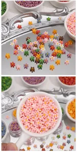 Detailed closeup of colorful resin flatback flowers for DIY crafts, phone case decor.
