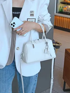 Premium genuine cowhide Boston handbag for women, stylish crossbody and shoulder bag.