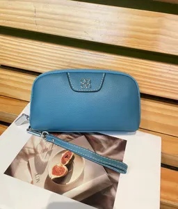 Blue leather wristlet wallet for women, top layer cowhide phone bag and coin purse.