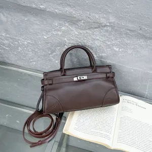 Dark brown leather top handle shoulder bag with classic design and metal hardware detail.