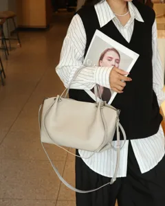 Genuine leather tote bag for women, stylish slouchy shoulder handbag with large capacity.