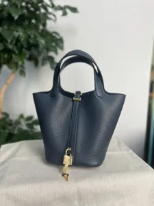 Sac seau en cuir de luxe pour femmes sac à main en cuir de vache avec cadenas en métal