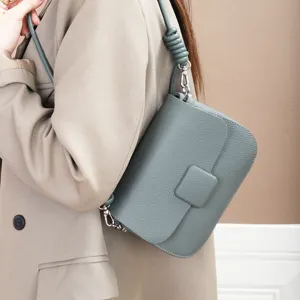 Grey-green genuine leather women's shoulder bag with stylish knotted strap and square lock.