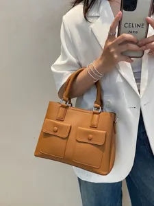 Elegant brown genuine leather women handbag, top layer cowhide commuter tote and shoulder bag.