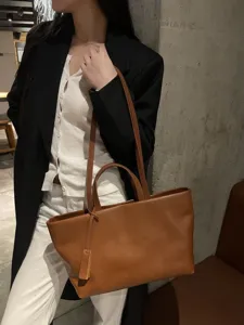 Retro genuine leather tote bag for women, stylish large capacity soft cowhide shoulder bag.