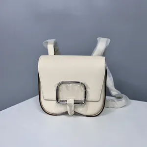 Mini leather saddle bag for women, stylish casual cross-body shoulder bag in cream white.