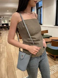 Details of genuine leather vertical phone crossbody bag for women, stylish minimalist mini shoulder bag.