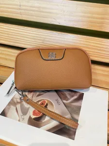Genuine leather clutch bag for women, versatile brown wristlet wallet with metal clasp.