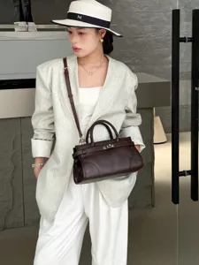 Elegant genuine leather top handle shoulder bag for women, retro style handbag.