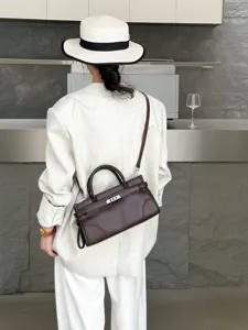 Classic genuine leather top handle shoulder bag for women, retro versatile casual crossbody bag.