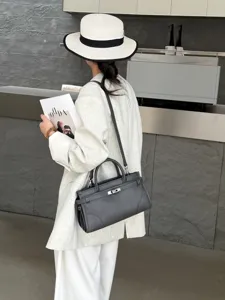 Genuine leather Kelly style shoulder bag for women, elegant retro crossbody handbag.