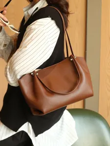 Stylish genuine leather shoulder tote bag for women, large capacity daily brown handbag.