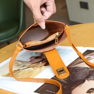 Genuine leather mini crossbody bag for women, stylish phone shoulder bag with turn lock.