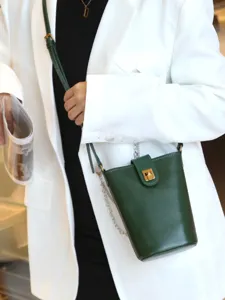 Green leather bucket bag for women, stylish minimalist crossbody bag for daily wear and phone.