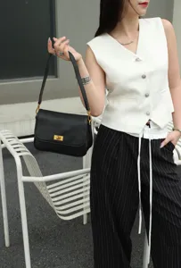 Genuine leather retro underarm bag for women, minimalist black shoulder bag with metal lock.
