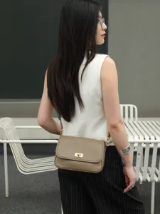 Genuine leather vintage crossbody bag for women, casual shoulder bag with metal lock design.