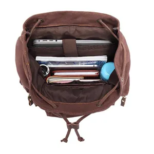 Vintage brown canvas backpack with large capacity, laptop compartment and multi-pocket for travel school.