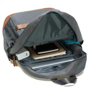 Casual canvas laptop backpack for men and women, spacious daily school book bag with compartments.