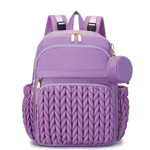 Large capacity multi-function diaper backpack with quilted design and convenient small pouch.