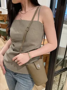 Genuine leather crossbody phone bag for women, stylish small shoulder bag with lock.
