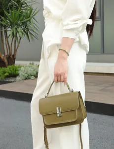 Stylish green genuine leather crossbody bag for women, premium top layer cowhide shoulder bag.