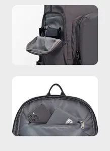 Grey memory fabric backpack detail showing multi-functional pockets, zipper compartments.