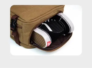 Canvas backpack with separate bottom shoe compartment, large capacity casual travel bag.