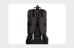 Casual grey travel backpack with luggage strap, perfect for business and outdoor trips.