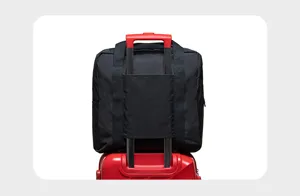 Travel duffel bag trolley sleeve detail, convenient luggage attachment for easy travel.