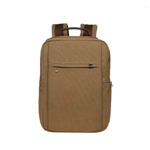 Casual brown canvas backpack for men and women, large capacity travel and outdoor daypack.