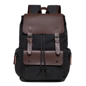 Vintage canvas backpack with brown leather flap, large capacity travel school bag for daily use.