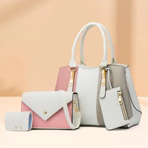 Stylish colorblock women handbag four-piece set, elegant shoulder tote and crossbody bag.