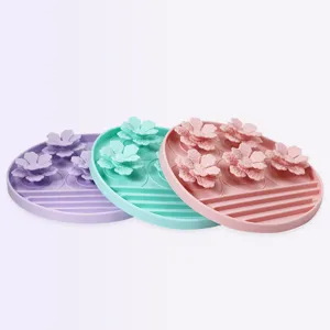 Silicone pet slow feeder mat with flower design, non-slip suction cup dog licking pad.