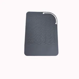 Tappetino resistente al calore in silicone grigio per piastra ferro arricciacapelli
