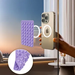 Double-sided silicone phone suction cup anti-slip pad with 40 suction cups for secure mounting.