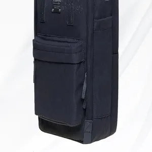Detail view of the dark blue casual backpack, highlighting front pocket and durable waterproof.