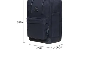 Classic solid color casual backpack with front pocket and handy side pockets for daily school use.