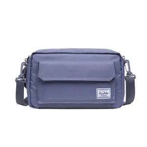 Men casual crossbody bag, stylish multi-pocket shoulder bag, durable fabric outdoor travel bag.
