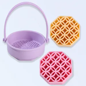 Silicone makeup brush cleaner bowl with multi-color pads for daily beauty tool washing.