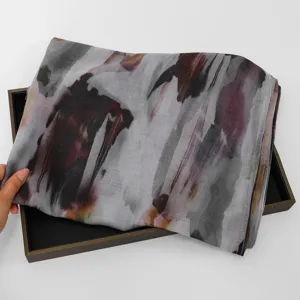 Detail shot of digital print cotton linen long scarf, versatile thin shawl for women.