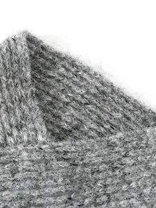Close-up detail of grey chunky knit fabric, showing warm thick texture for winter neckwear.