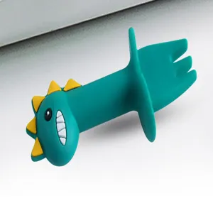 Siliconen dinosaurus baby vork detailopname, zacht en veilig materiaal voor kind.