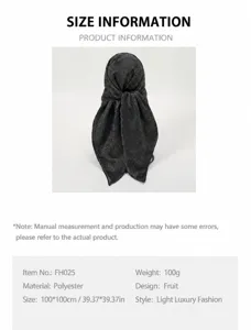 Detailed view of the black paisley print polyester headscarf showing texture and fabric design.