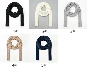 Hollow knit long sleeve shawl scarf detail, elegant cross design variant, autumn winter wear.