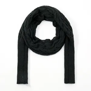 Black knitted hollow out sleeve scarf detail shot showcasing fine texture and unique design.