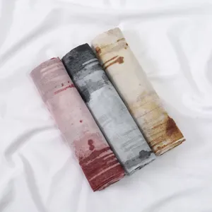 Women's artistic printed gradient long scarf shawl set, elegant rolled display.