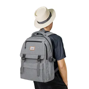 Grey casual canvas backpack for men, ideal for daily commute, school, and outdoor travel.
