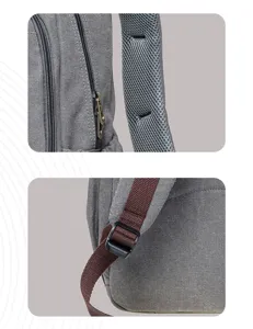 Grey canvas backpack detail featuring breathable mesh shoulder strap, metal zippers and sturdy buckle.