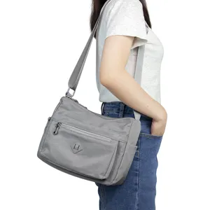Casual gray crossbody shoulder bag for women daily commute and travel wear showcase
